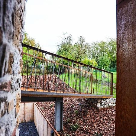 Amazon Corten Marche-en-Famenne Luaran gambar